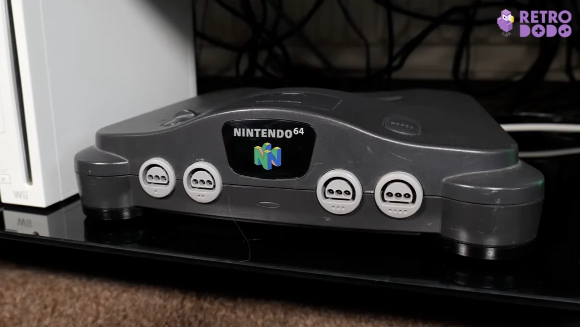 Nintendo 64 on a black shelf