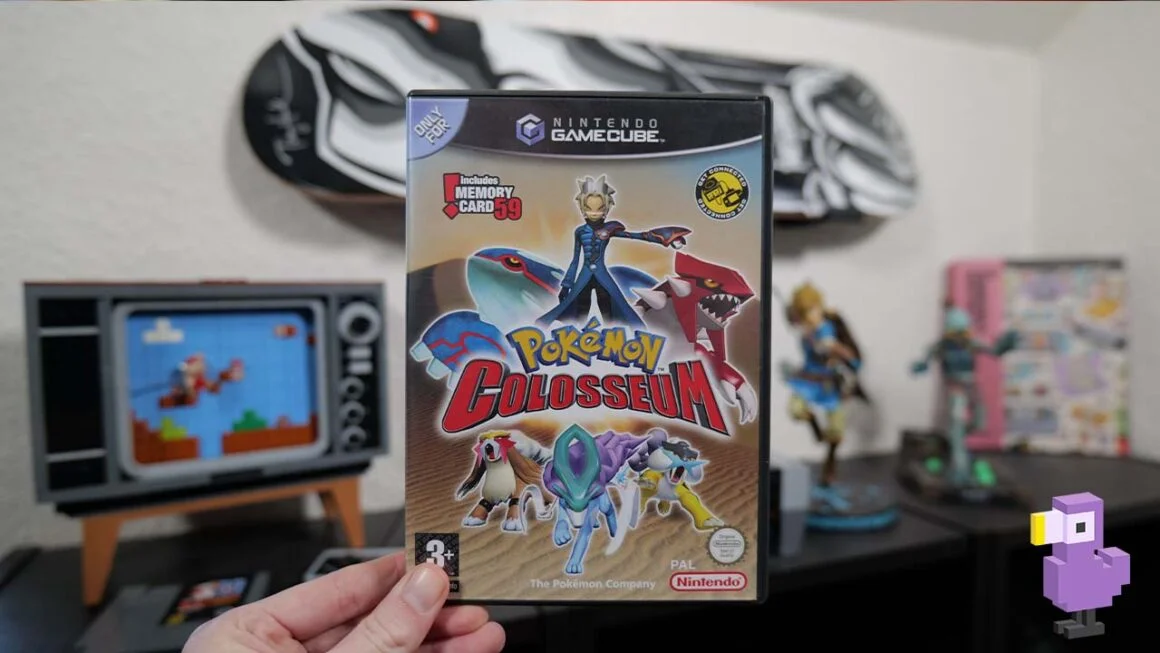 Rob holding his copy of Pokemon Colosseum for the GameCube