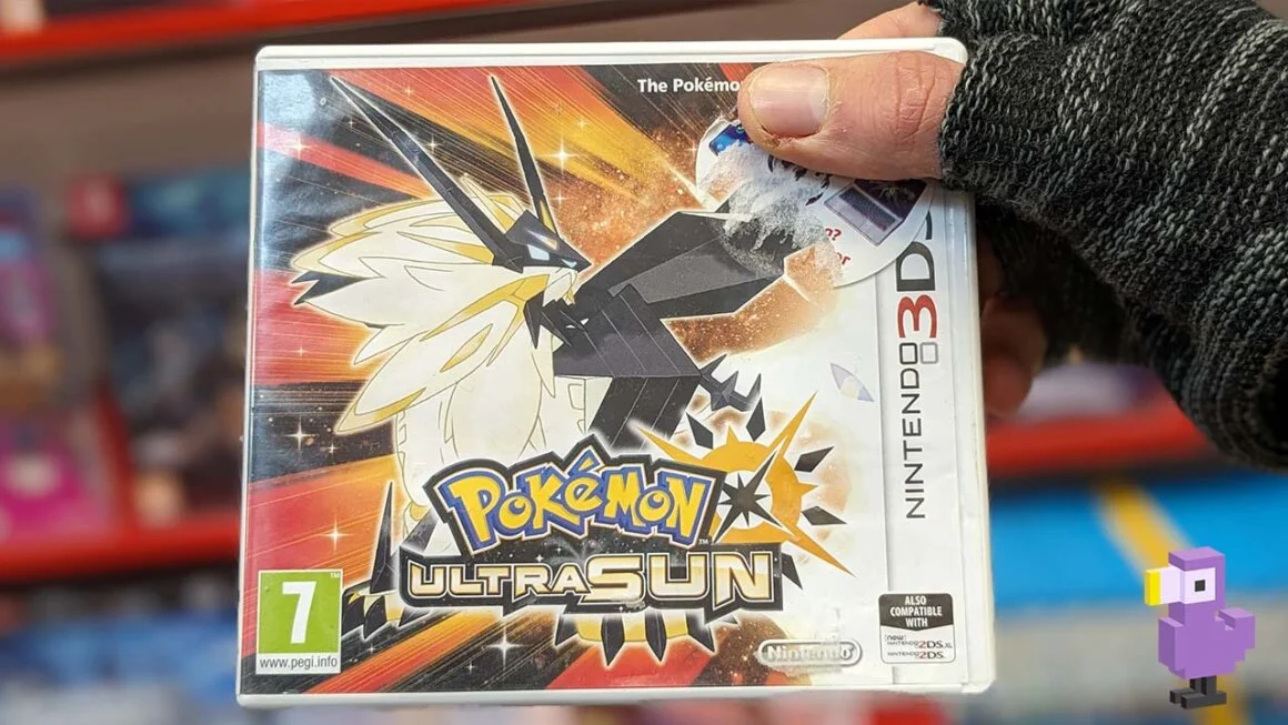 pokemon ultra sun 3DS game box held by Theo