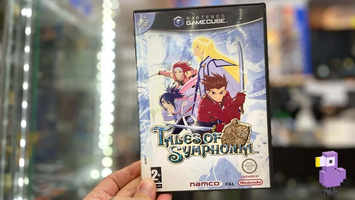 Seb holding a copy of Tales Of Symphonia for the Nintendo GameCube
