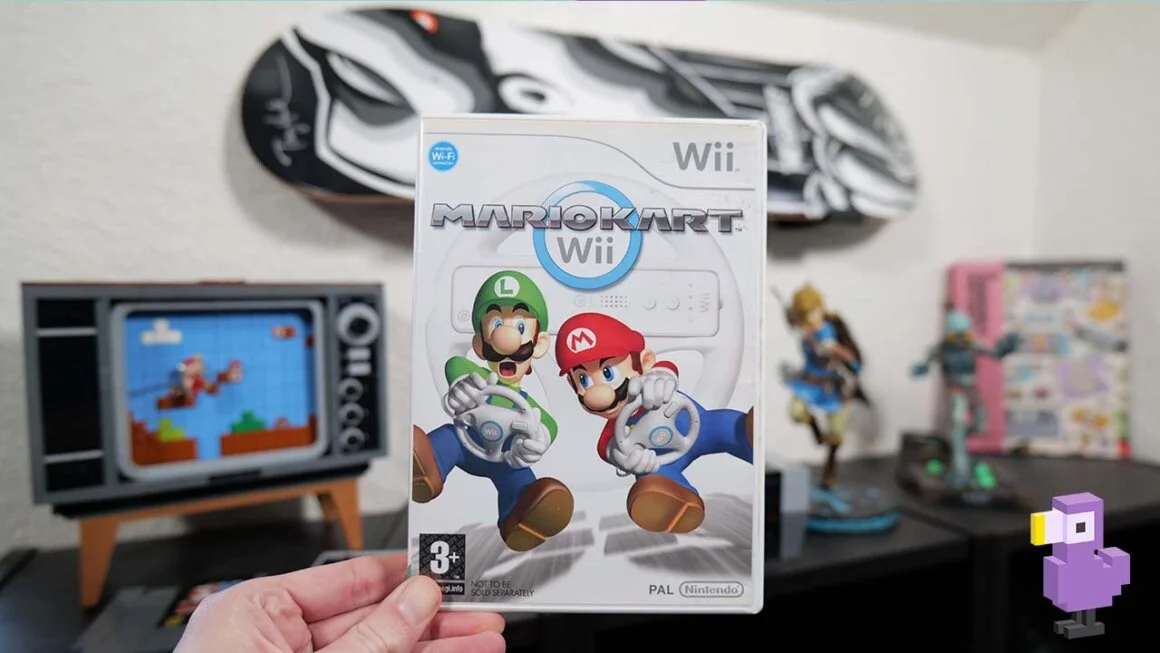 mario kart wii game case held by Rob