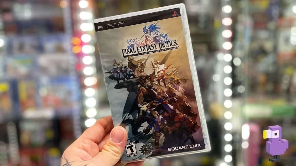 Seb holding Final Fantasy  Tactics War of the Lions for the PSP