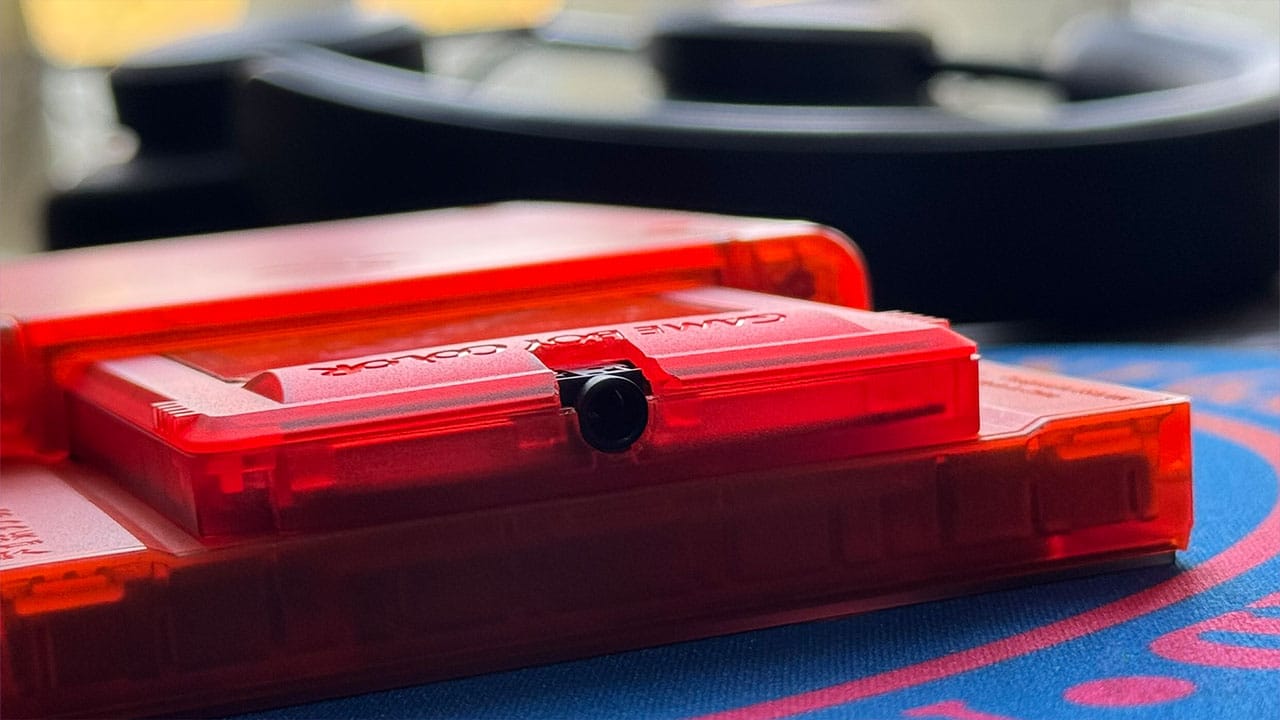 A close up view of the headphone jack in the Orange FM cart