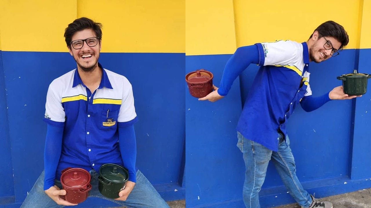 Carlos holding pots outside of the store for one of his social media adverts