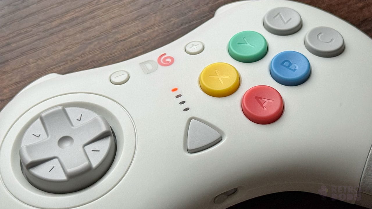 A close up of the face buttons on the DG Dreamcast controller from Retro fighters