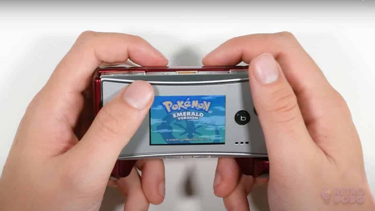 Brandong holding a Game Boy Micro