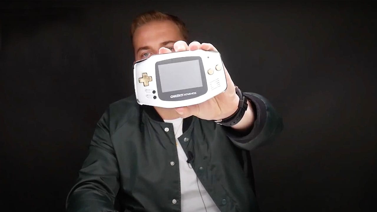 Brandon holding a metal Game Boy Advance