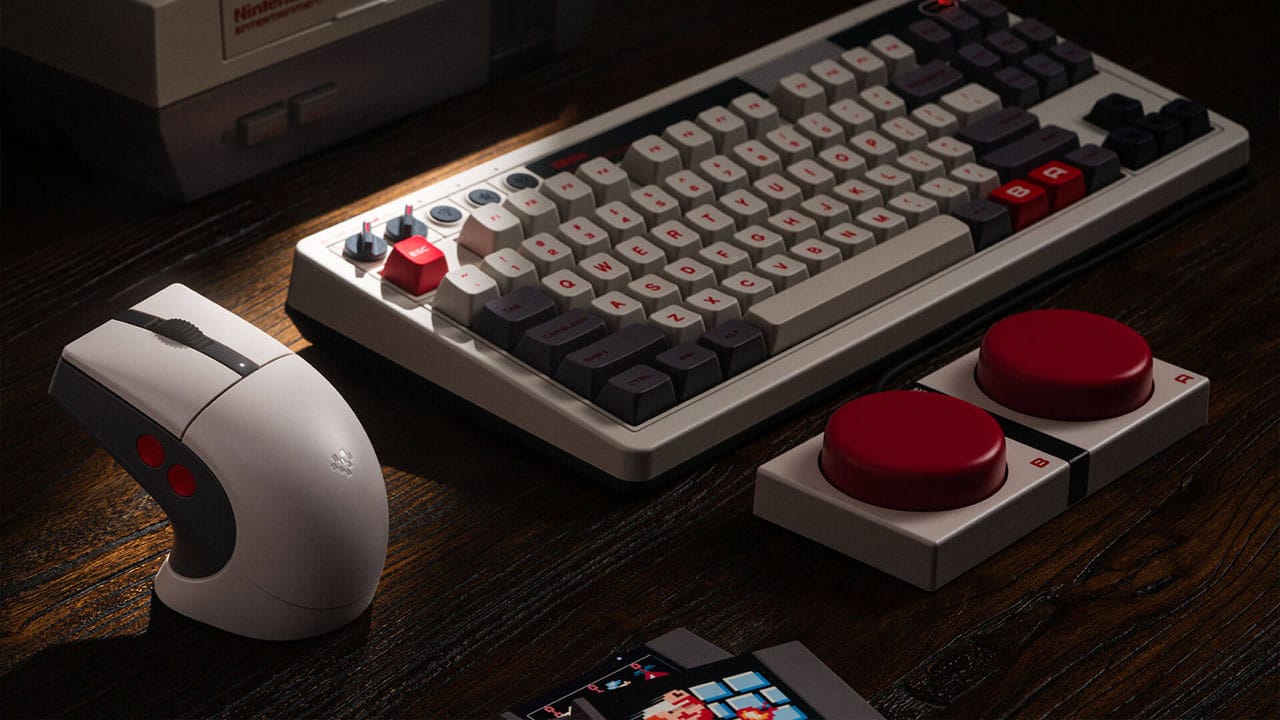 The NES-themed mouse next to 8BitDo's NES keyboard