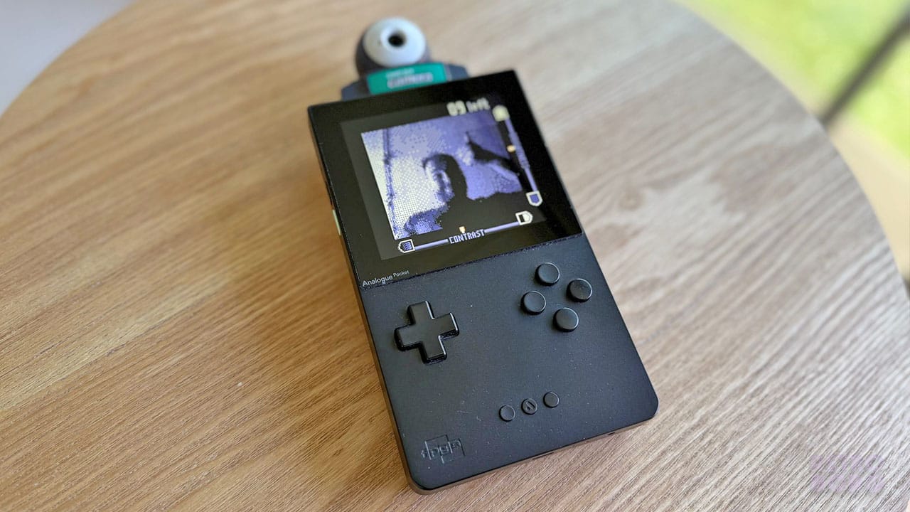Brandon taking a picture of himself using his Game Boy Camera