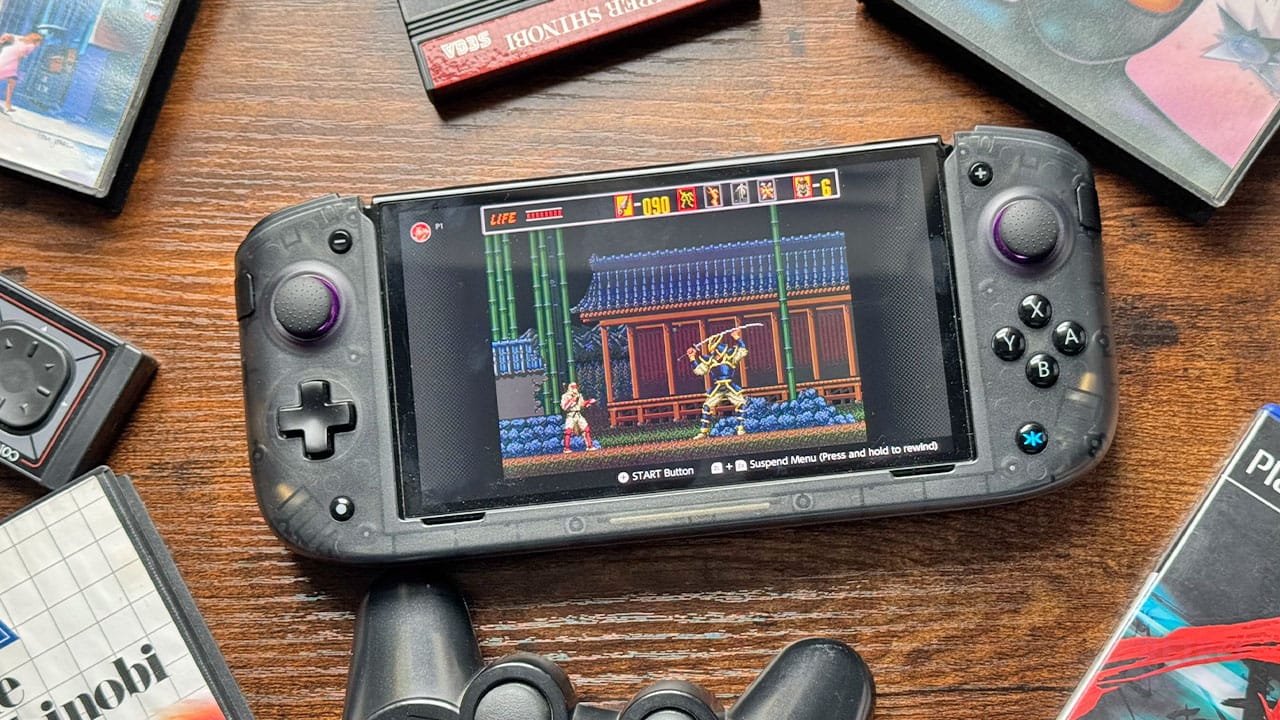 A Nintendo Switch surrounded by gaming accessories