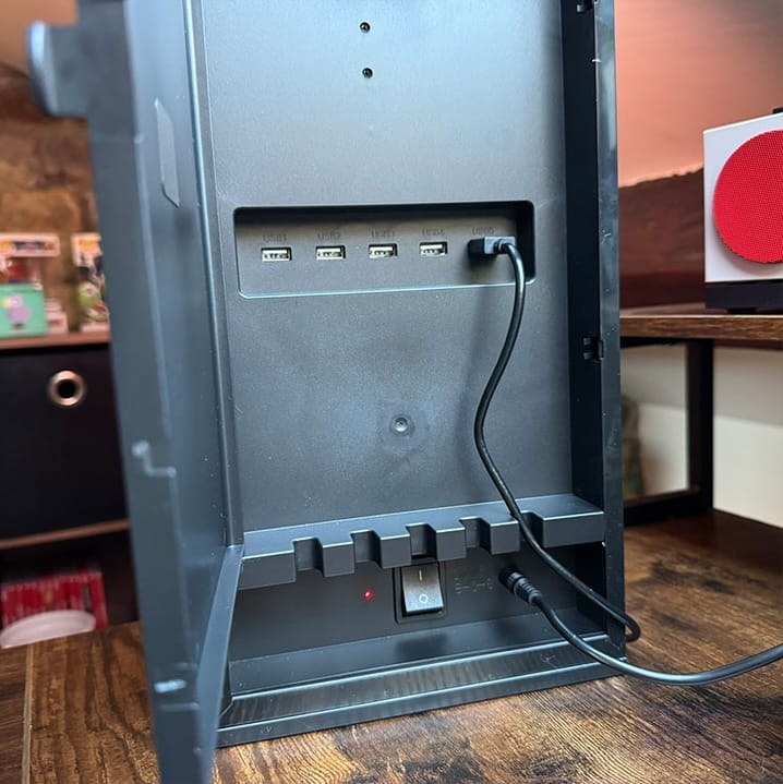 A close up of the USB power slots on the back of the hub