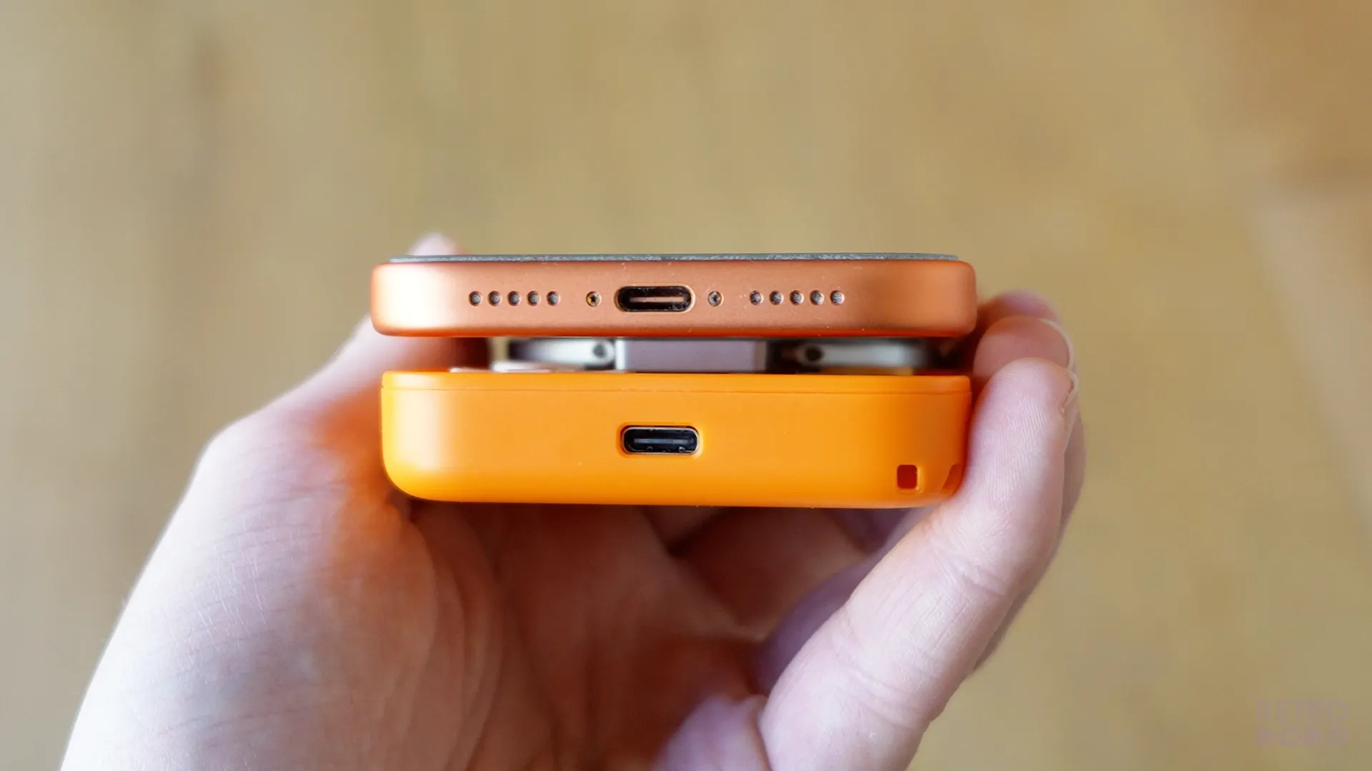 Bottom profile of charging ports on the iPhone and M4 mobile controller