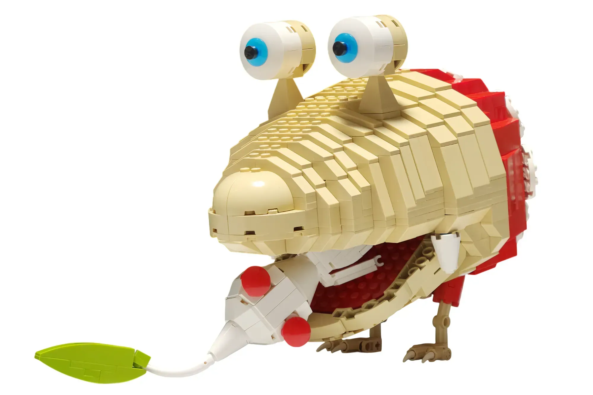 A Red Bulborb eating a White Pikmin
