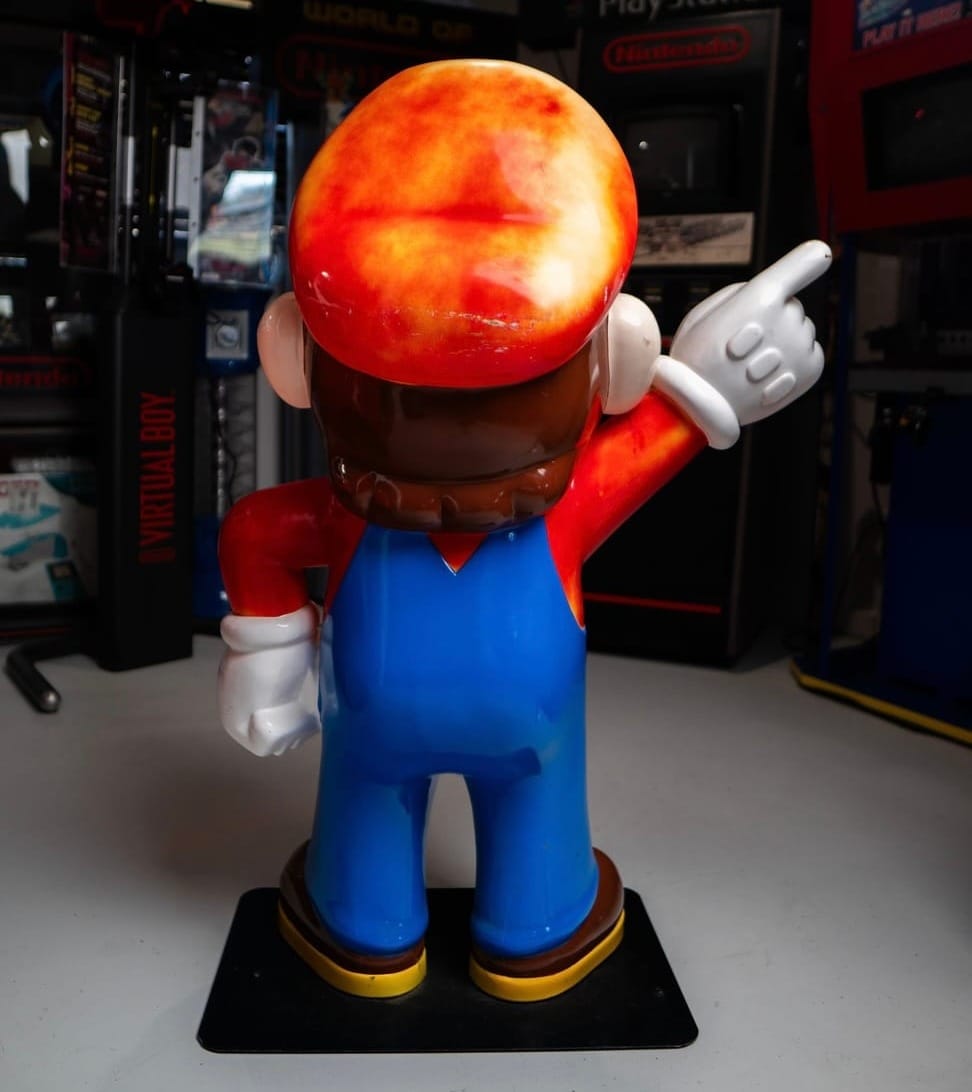 Back of the Mario promotional statue being sold by Insert Bid
