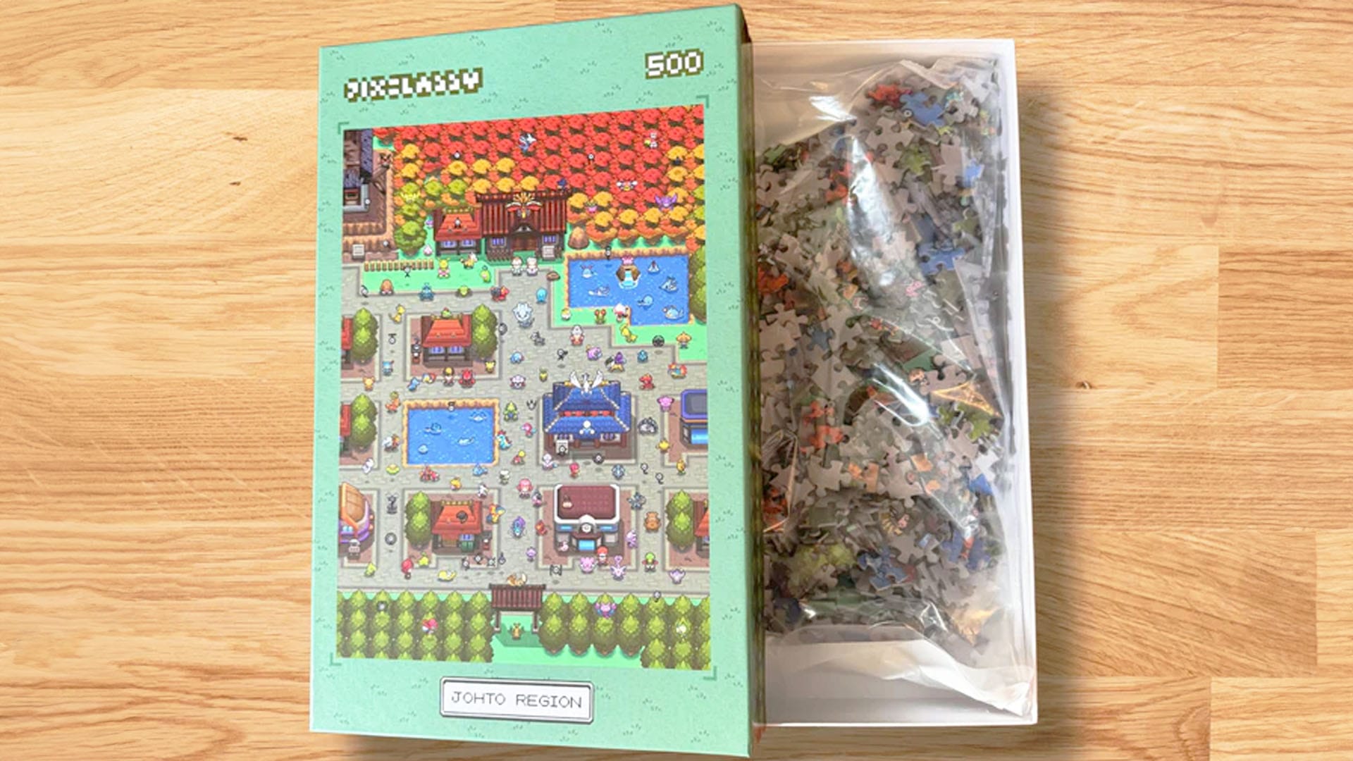 pixeladdy Johto box with jigsaw pieces in a bag