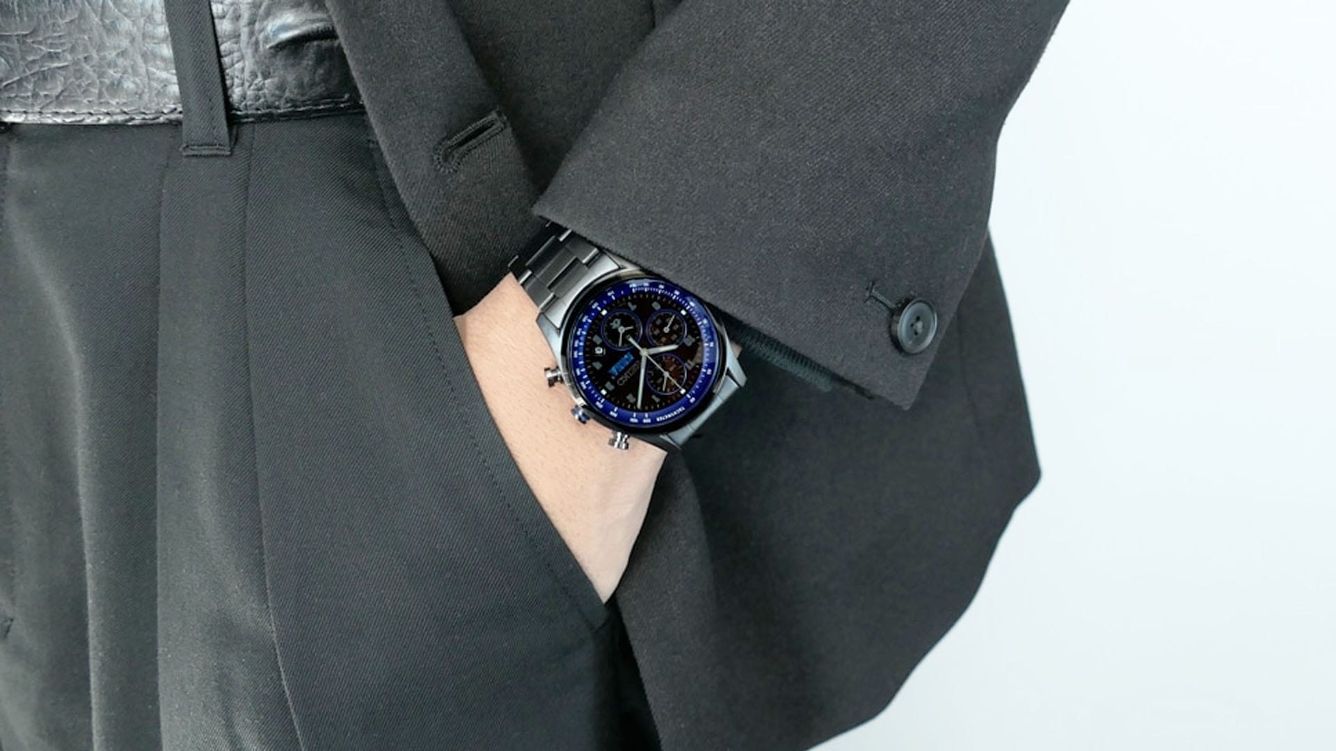Black Sega watch worn by a businessman