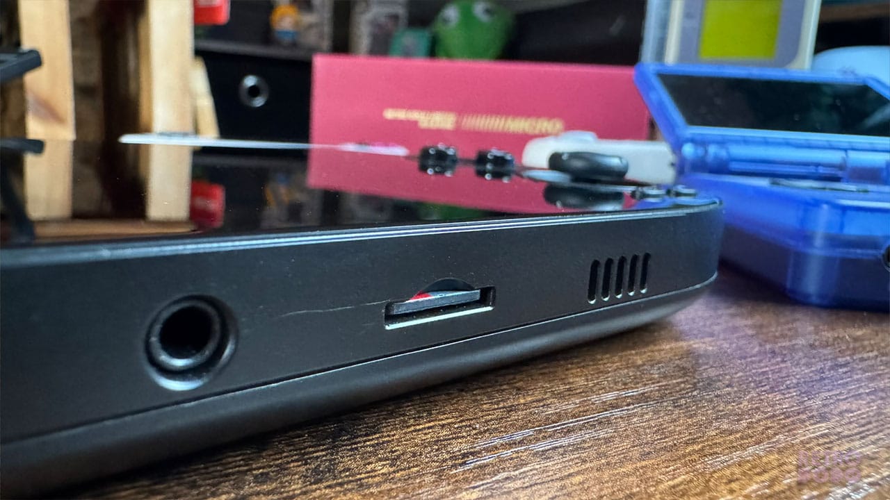 microSD card slot with a scratch next to it