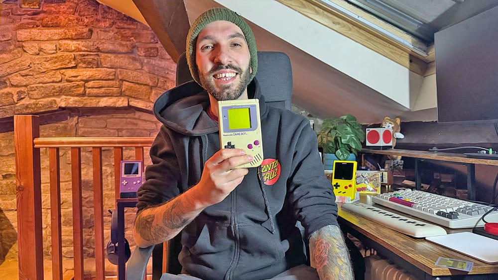 Seb holding a GameBoy DMG