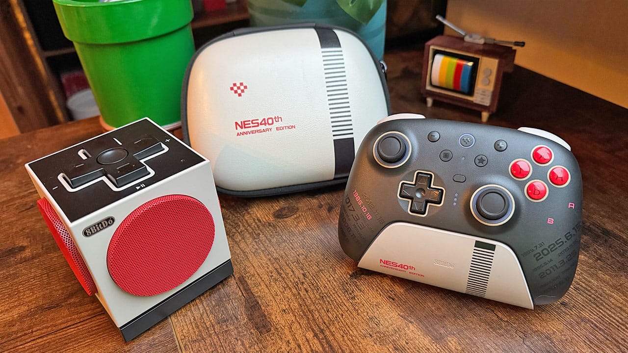 Two items from the N40 collection from 8BitDo with a carry case on a wooden desk