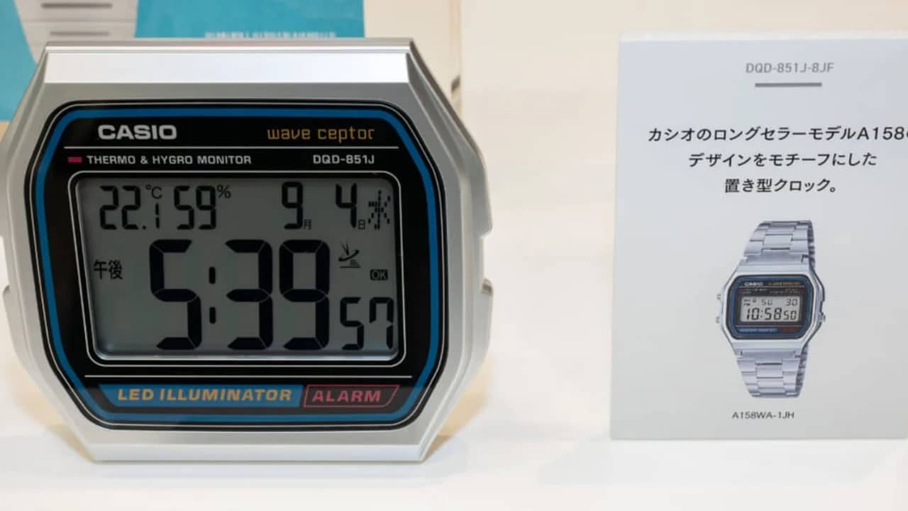 Casio Desk Clock next to its watch counterpart