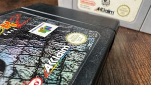 Two game cartridges with the Acclaim logo on them