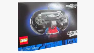 Image of a LEGO Box with a Sega controller on the front of it made out of LEGO