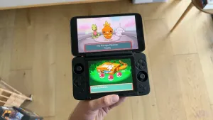 Brandon holding a Pocket DS from AYANEO