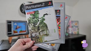 Rob holding 3 PS2 games