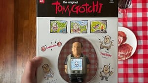 Close up of a Tonygotchi in a box