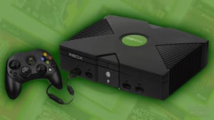An Original Xbox sitting over the top of our Xbox game collection