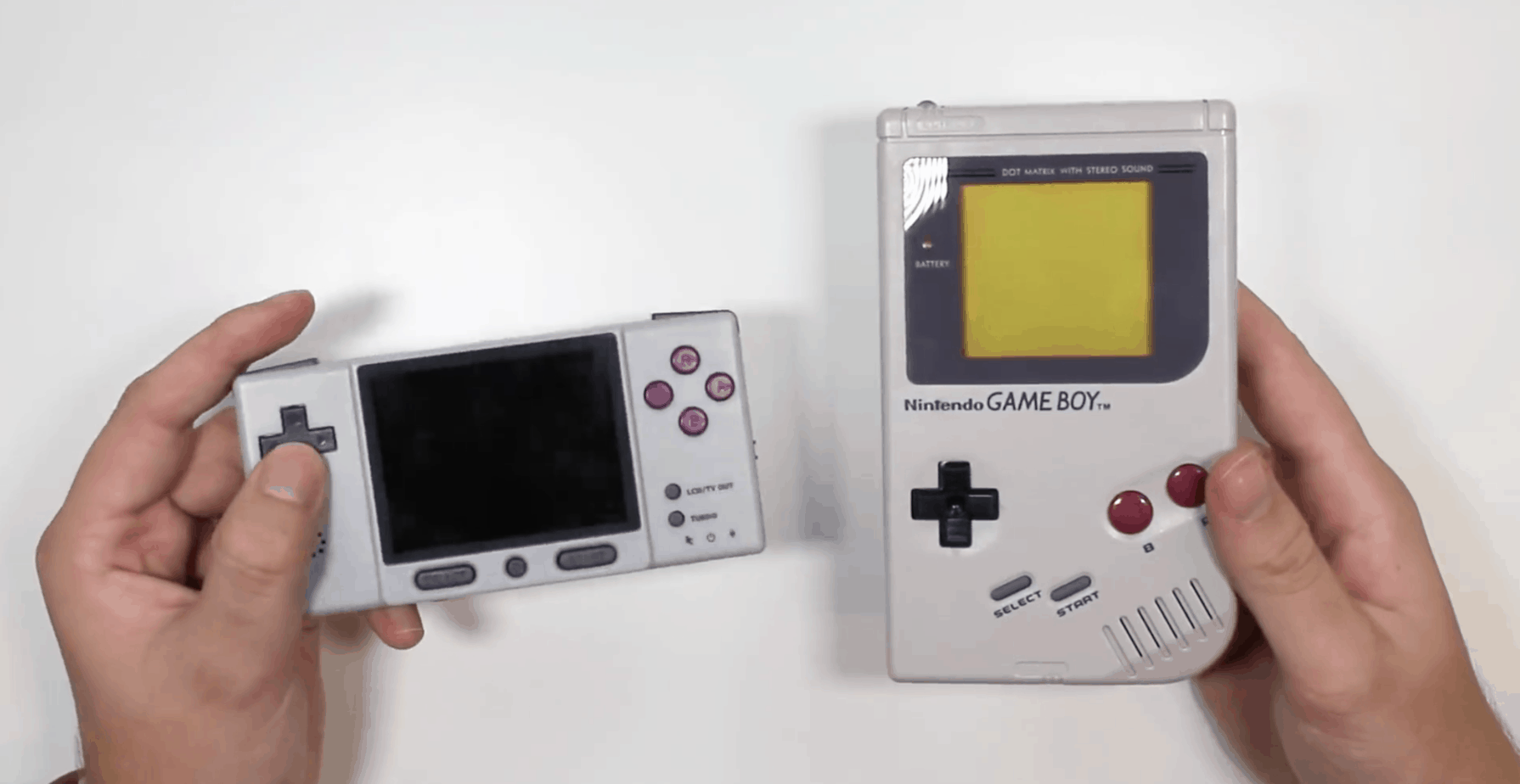 The Retroboy in Brandon's left hand next to the Game Boy in his right hand