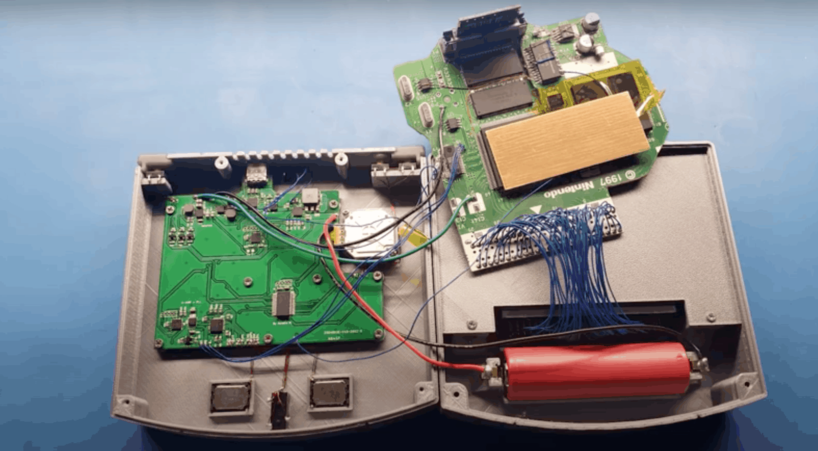 Nintendo 64 Handheld open with the gubbins exposed