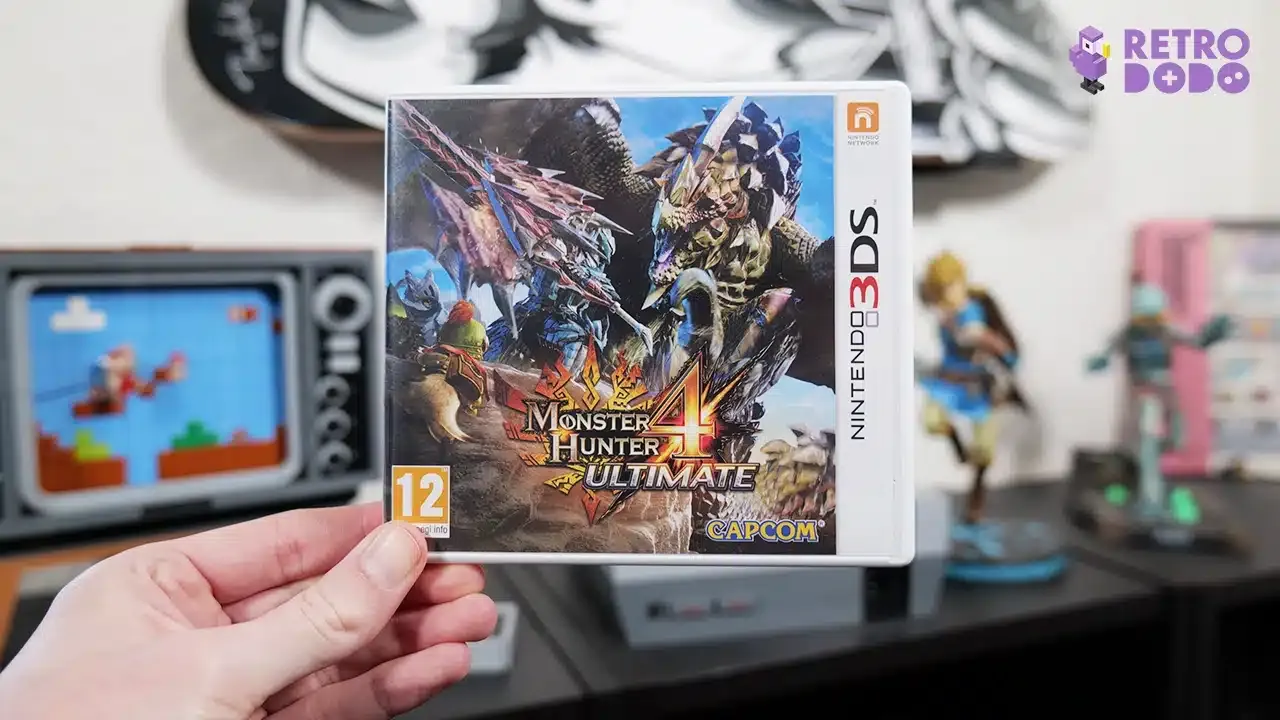 monster hunter 4 ultimate game box held by Theo