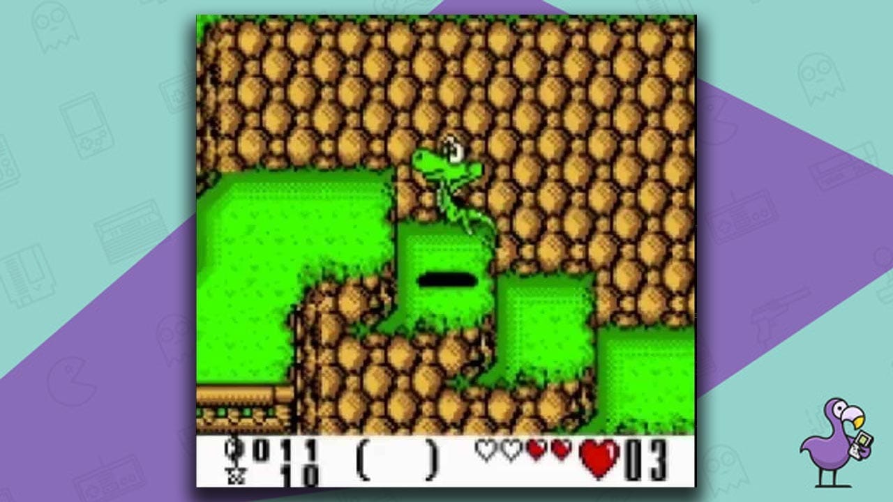 Croc Jumping up a series of grassy ledges - Croc 2 GBC gameplay