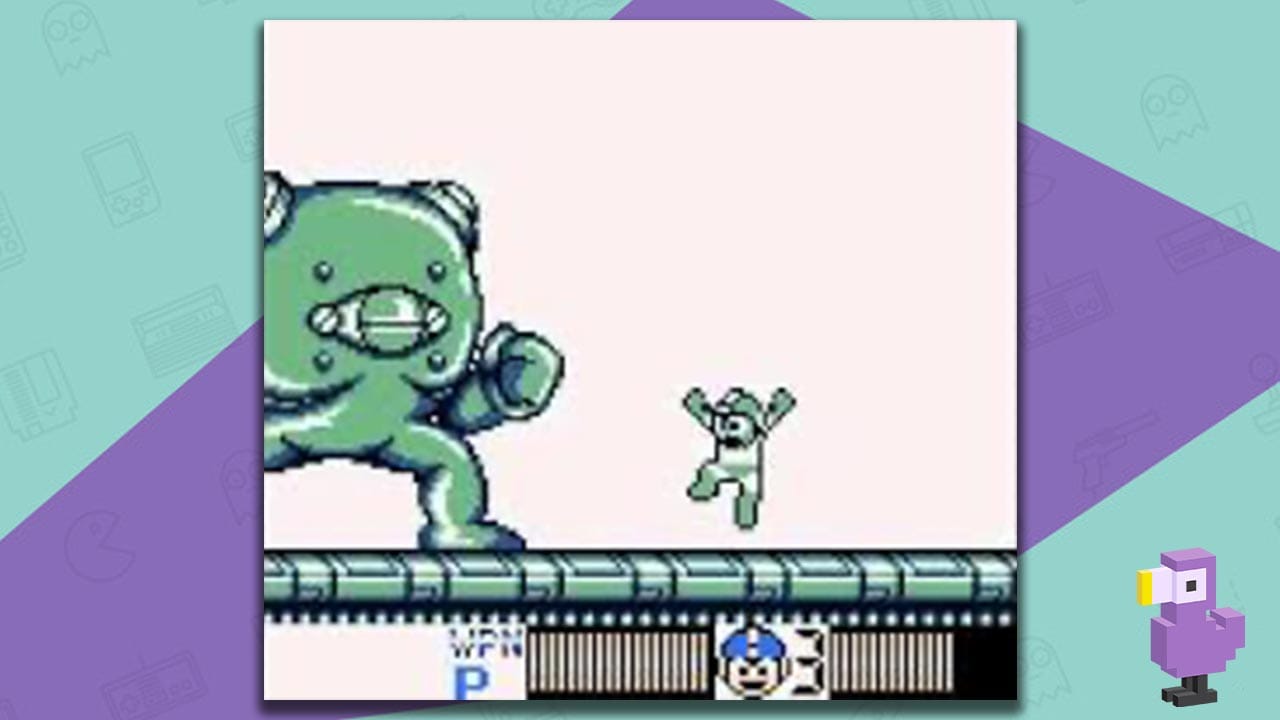 Mega Man V gameplay, with Mega Man jumping towards a large one-eyed enemy