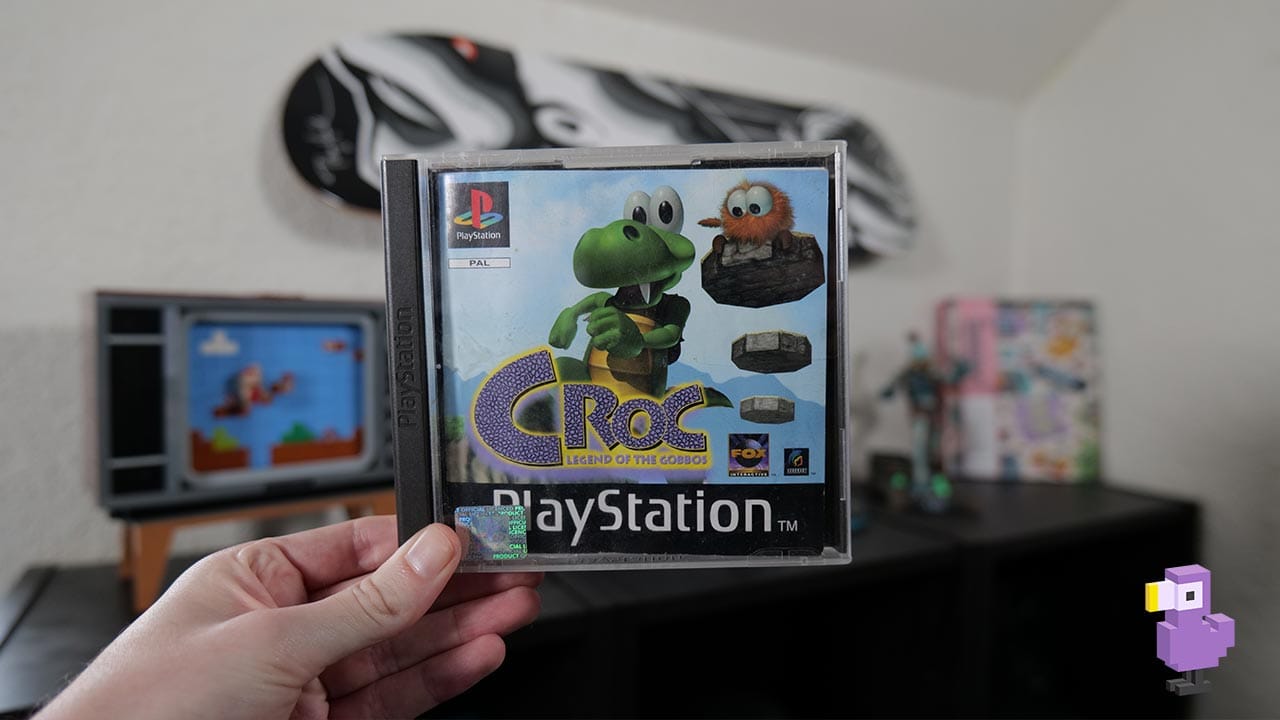 Croc: Legend of the Gobbos PS1 game case held by Rob