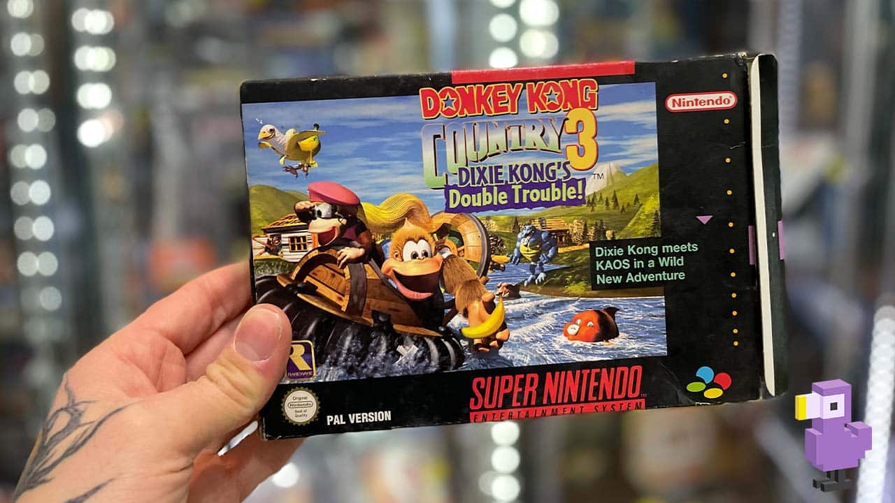 Donkey Kong 3 Game box held in Seb's left hand