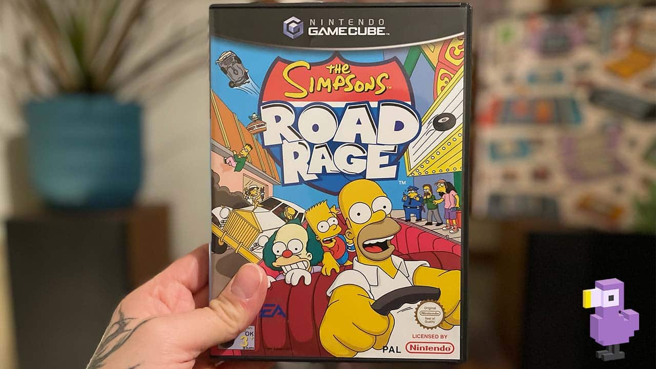 Seb holding his copy of Simpsons Road Rage