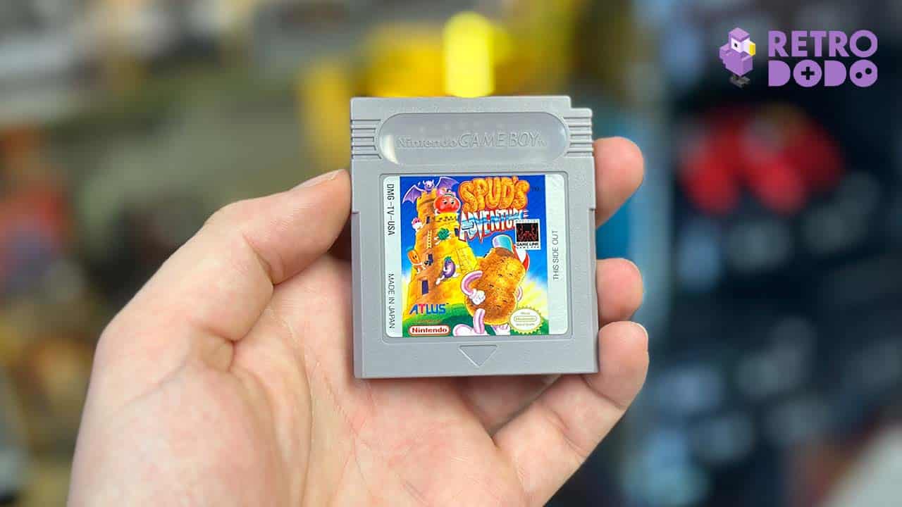 Nintendo Gameboy cart for Spud's Adventure, held by Brandon