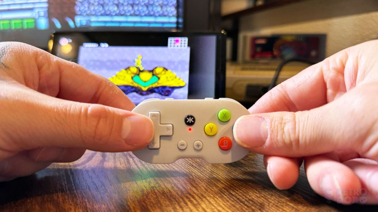 Holding the PAL Grey ATOM while playing Super Metroid on the Switch