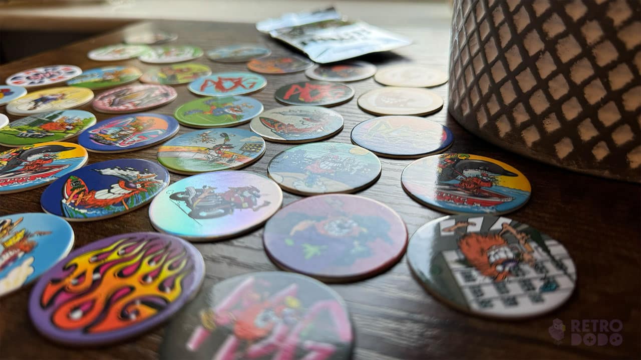 POGs spread across Seb's desk