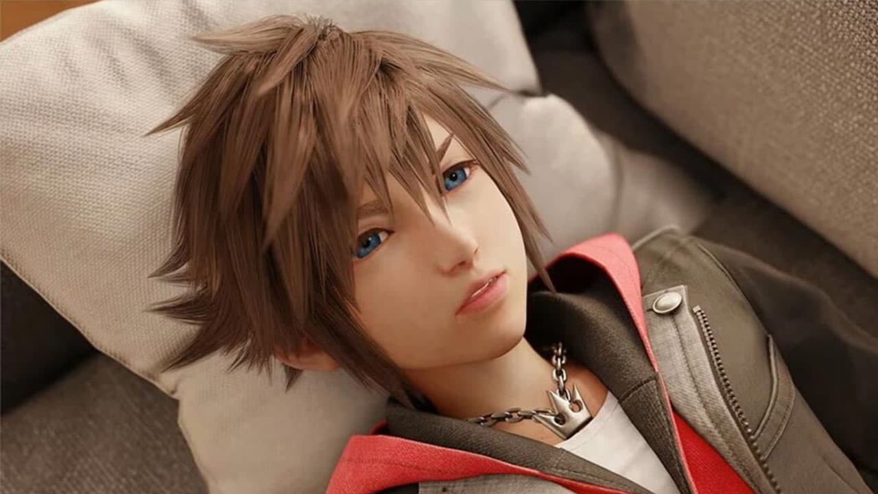 Sora laying on his back on a sofa