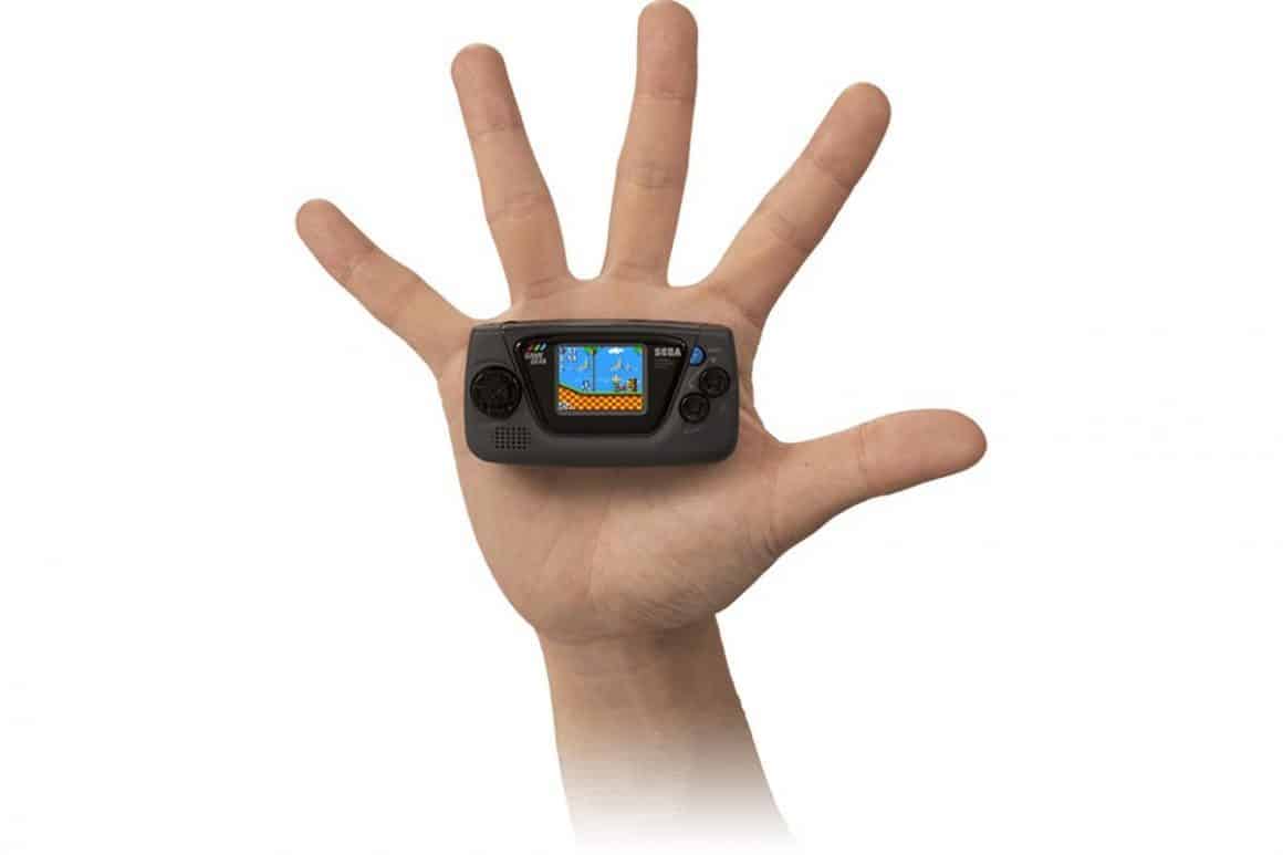 Game Gear Micro in a palm. Small console
