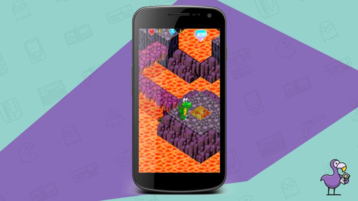 Croc Mobile: Volcanic Panic! gameplay on a smartphone, with Croc standing on a rock in the middle of Lava.
