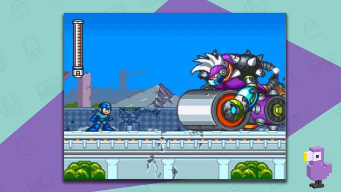 Mega Man 7 gameplay, with Mega Man squaring up against a large purple robot with a huge roller for a front wheel.