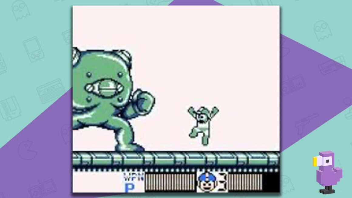Mega Man V gameplay, with Mega Man jumping towards a large one-eyed enemy