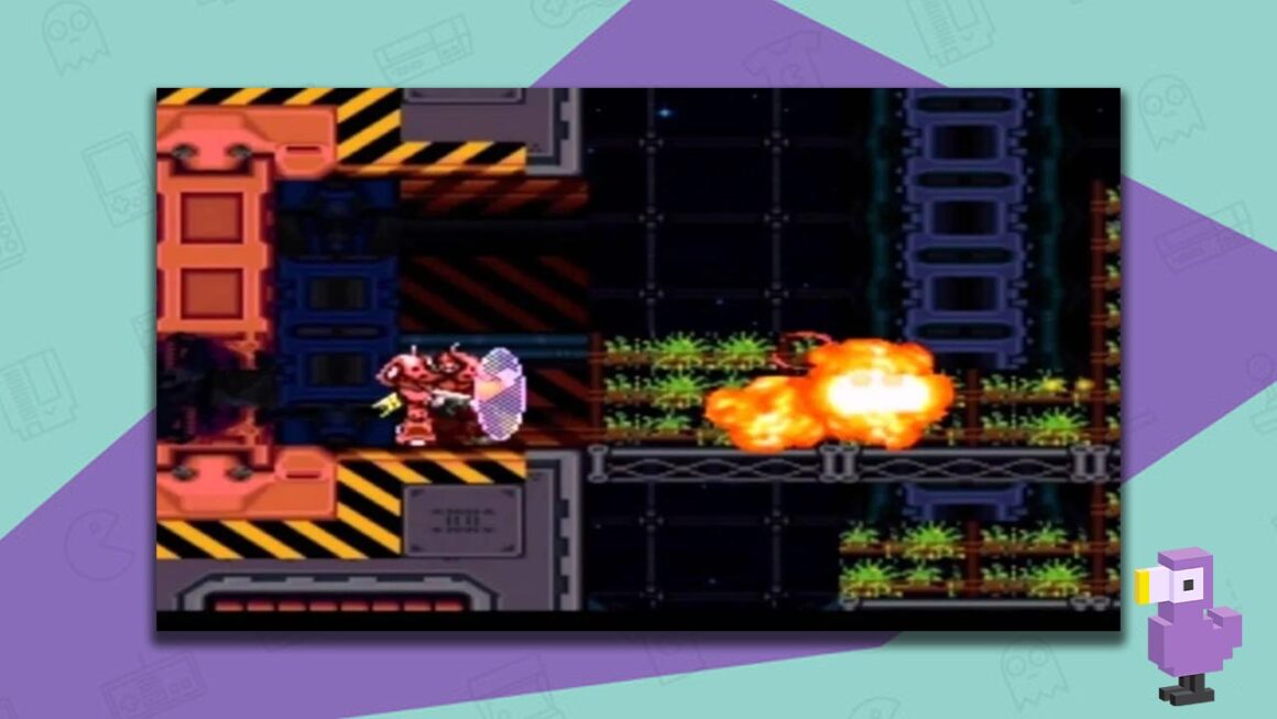 Metal Warriors gameplay showing a red mech warrior with a shield moving through a factory setting