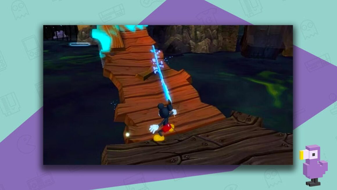 Mickey using a blue brush in Disney's Epic Mickey gameplay