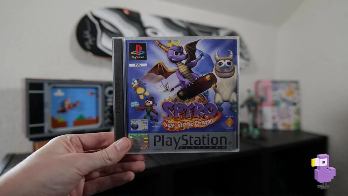 Rob holding his copy of Spyro: Year of the Dragon for the PS1