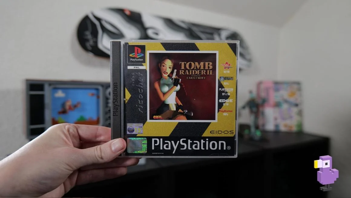 Tomb raider II game case in Rob's hand 